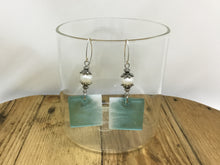 Load image into Gallery viewer, Shimmering Drop Resin Earrings in Aqua with Pearl

